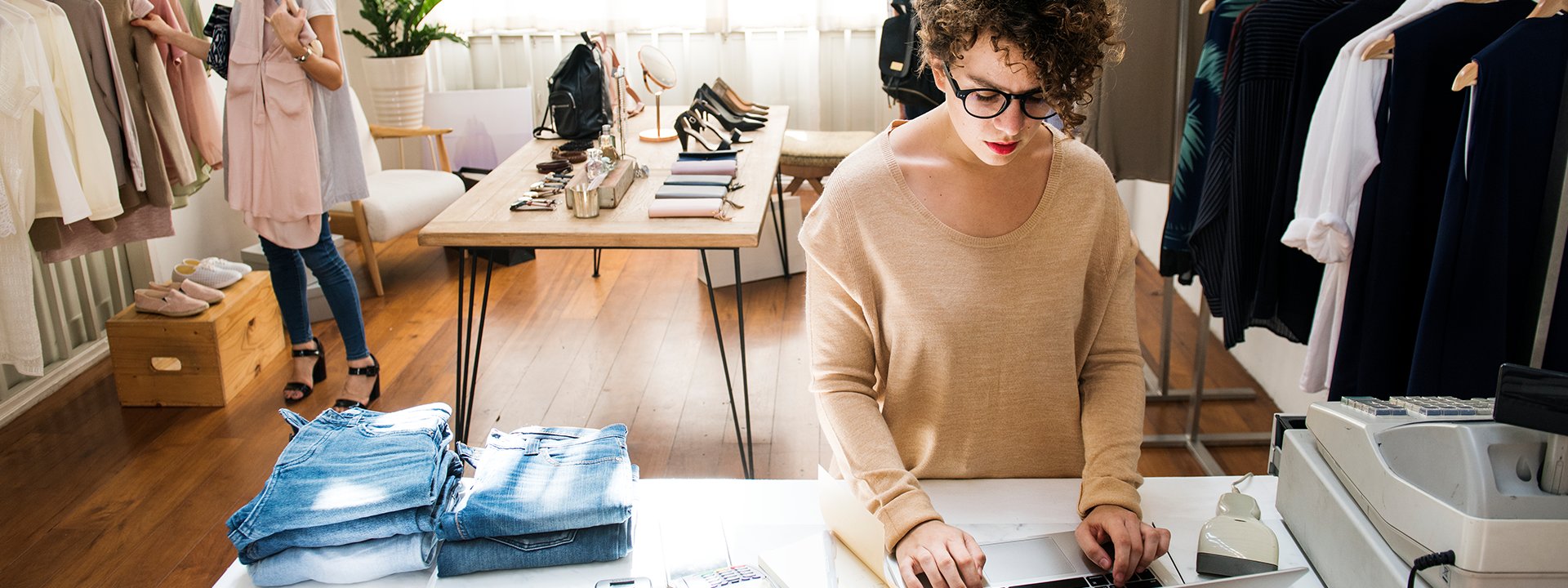 woman working in clothes shop